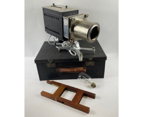 A VINTAGE OPTISCOPE No8 part 'Magic Lantern circa 1930's/40's, with spare bulb, all within its original metal carry-case, the