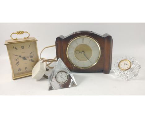 Collection of clocks to include a WATERFORD CRYSTAL clock standing 8cm high, an EDINBURGH CRYSTAL pyramid shaped clock standi