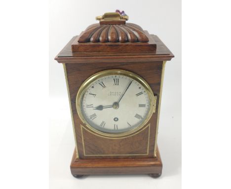 A BROCK London with French movement walnut veneer MANTLE CLOCK with Roman Numerals with round dial and brass fitted handle wi