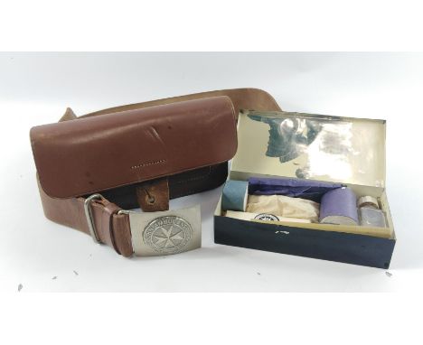 A WW2 St John's Ambulance belt and buckle and FIRST AID leather pouch complete with its  First Aid tin and possibly original 