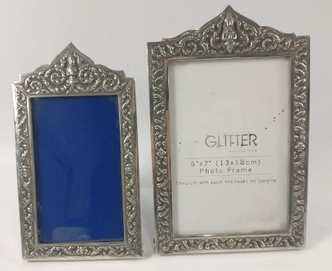 TWO VINTAGE STERLING SILVER stamped photograph identical pattern frames in Burmese style, the smaller frame stamp sterling is