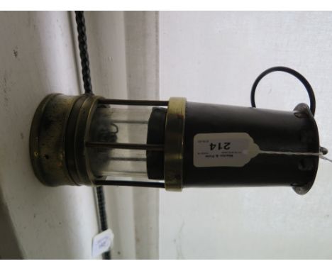 A brass miner's lamp