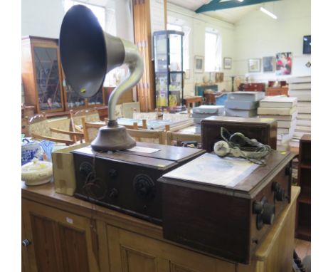 Two 1920s oak cased valve radios, a Celestion table top speaker, a British Thomson-Houston horn speaker, a VHF radio receiver