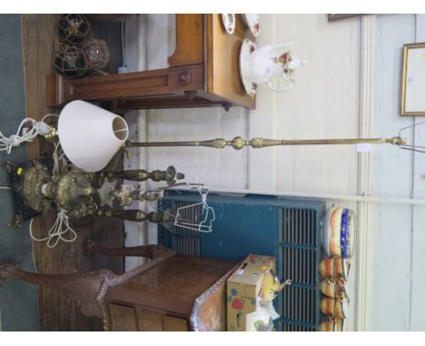 A pair of brass baluster table lamps, a French gilt metal table lamp, a standard lamp and another table lamp