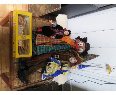 A large Pelham ventriloquist's clown marionette puppet, a Pelham Fairy puppet and three other marionettes