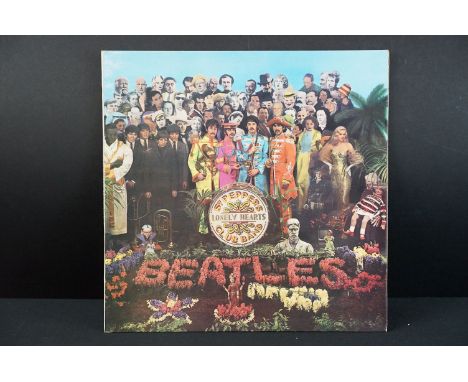 Vinyl - The Beatles Sgt Pepper on Parlophone PMC 7027. Original UK mono pressing with red flame inner, and cut outs, 1/1 matr