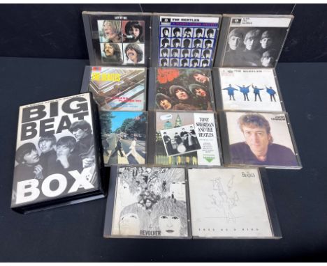 CDs - 11 The Beatles CDs along with The Beatles Big Beat Box CD &amp; VHS set on Merlin.