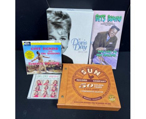 CDs - 2 CD box sets, 2 CDs and 1 DVD box to include Sun Records (50 Golden Years), Fats Domino, Doris Day (DVD box set), Clif