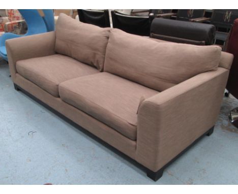 SOFA, two seater, of large proportions in brown fabric on ebonised wooden frame, 235cm L.