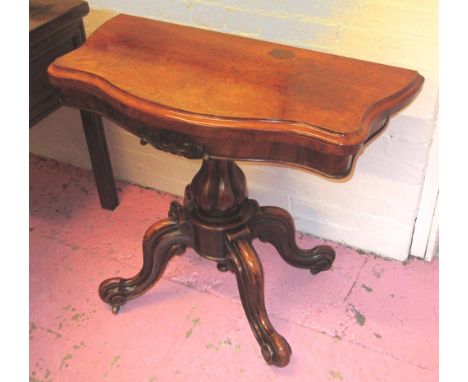 CARD TABLE, mid Victorian burr walnut with a serpentine shaped swivel fold over top enclosing a baize lined interior on a lob