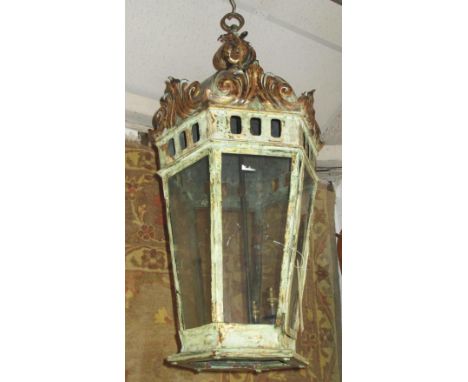 HALL LANTERN, 19th century Venetian green painted and gilt metal of hexagonal form with glass panels and three central lights