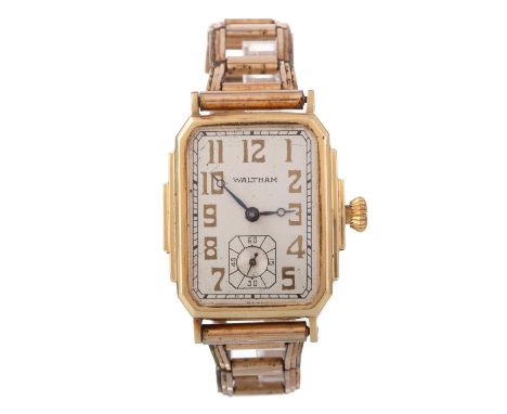 WALTHAM, ART DECO FOURTEEN CARAT GOLD MANUAL WIND WRIST WATCH, the rectangular dial with Arabic hour markers, 26mm case, on a