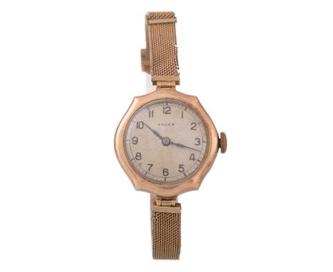 LADY'S ROLEX NINE CARAT GOLD MANUAL WIND WRIST WATCH, the round dial with Arabic hour markers, outer seconds track in black, 