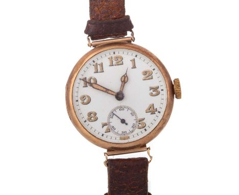 NINE CARAT GOLD MANUAL WIND TRENCH WATCH, WWI, the round dial with Arabic hour markers, outer railroad seconds track, 30mm ca
