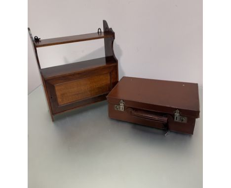 An Edwardian oak wall cabinet with open shelf to top and panel door to base, (h 45cm x 39cm x 15cm) and a small card and leat