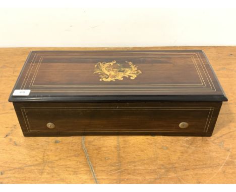 A Rosewood, marquetry, boxwood strung and ebonised Swiss cylinder music box, late 19th century, playing six airs, with paper 