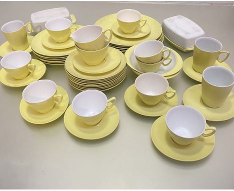 A Gaydon Melmex yellow mid-century melamine part tea, coffee, breakfast and dinner service, including milk jug, sugar bowl, n