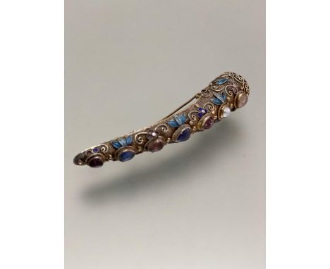 A Chinese white metal filigree work nail guard mounted with cultured pearl, miscellaneous semi-precious stones and enamel lea