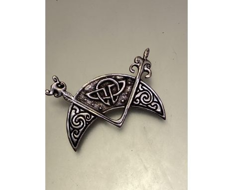An Iain MacCormack, Iona silver crescent Celtic brooch, stamped verso INC Iona,  (6cm x 4cm)