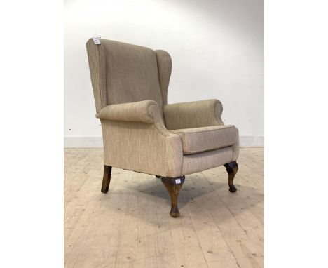 A Georgian style upholstered wing chair, first half of the 20th century, H100cm, W80cm. D78cm