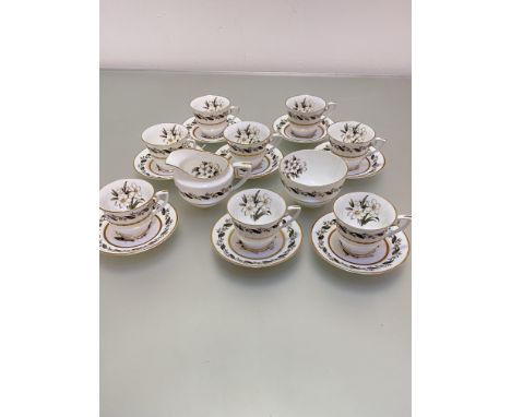 A Royal Worcester Bermina floral decorated 18-piece coffee set