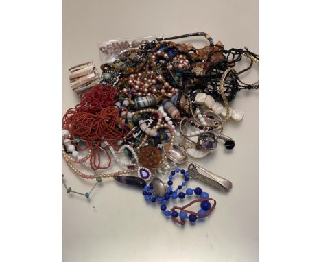 A collection of costume jewellery including Murano style bead necklaces, coral style bead necklaces, hardstone necklaces, two
