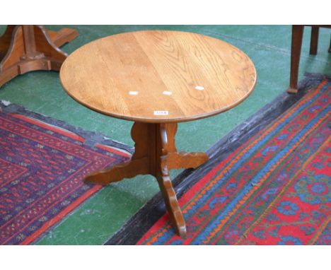 An Old Charm occasional table, circular top, trriform shaped pedestal base