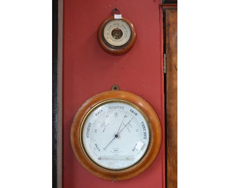 A 20th century wall hanging barometer/thermometer, stained frame; another smaller 