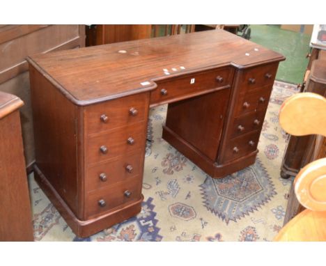 A Victorian mahogany twin pedestal desk