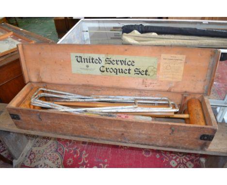 A United Service croquet set by the army and navy co-operative society, LTD 105, Victoria street Westminster S W dated 25/6/0
