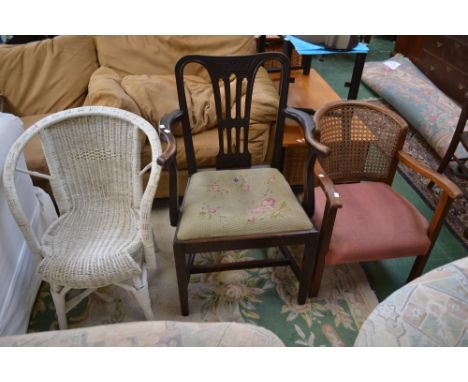 A George III open arm chair, pierced splat, shaped arms, drop in tapestry seat; wicker backed tub chair; a Lloyd Loom style c