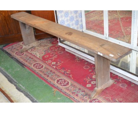 A late 19th century rustic oak French bench