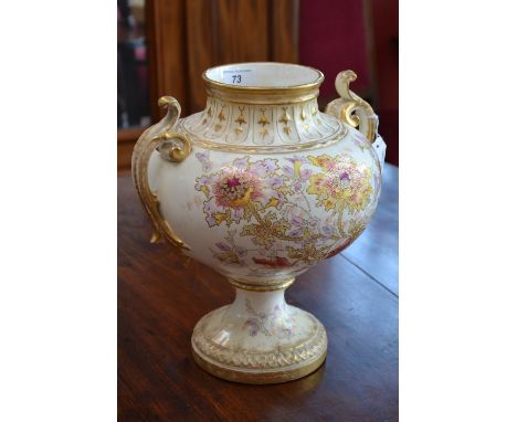 A Royal Bonn pedestal vase, decorated with large flower heads on an ivory ground, printed mark, c.1900