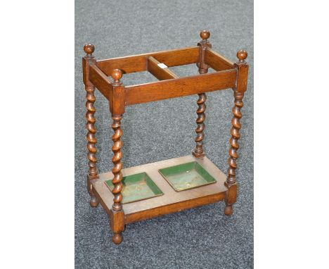 A 1930's/40's stick stand, knop finials, barley twist uprights