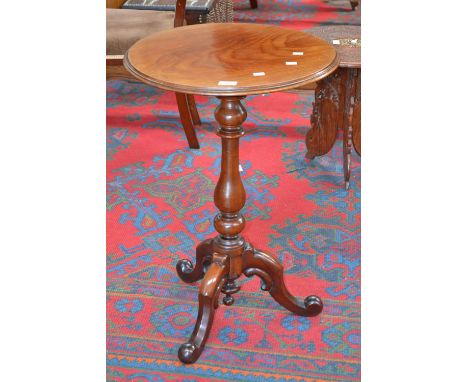 A Victorian mahogany tripod table, circular top, turned baluster fruitwood column, cabriole legs, knurled feet.