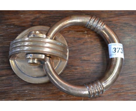 A 1920's-30's deco brass door knocker