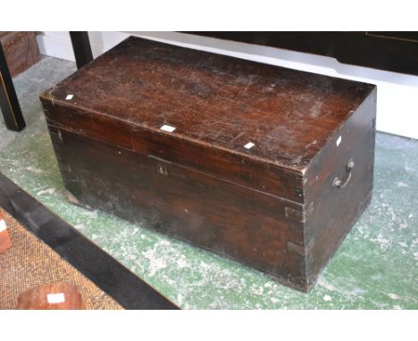 A late 19th century travelling trunk, hinged lid, candle box, folding drop forged handles, c.1880