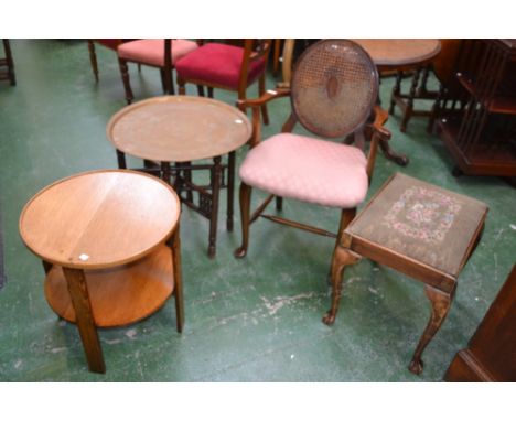 An Adam style armchair; an Art Deco oak circular coffee table; an Eastern brass topped folding table; a George I style stool 