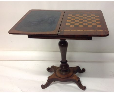 William IV mahogany and inlaid games table, the D-shaped fold-over top inlaid for backgammon and chess, with well below, rais