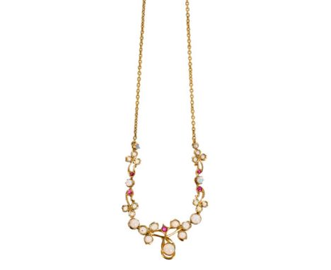 Edwardian opal and ruby necklace with articulated trailing foliage on gold trace chain, in box CONDITION REPORT Very good con