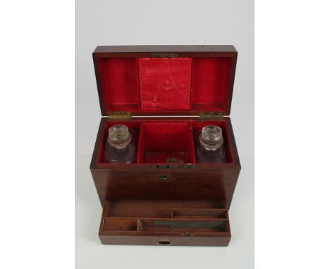George III mahogany cased apothecary box, with flush brass carrying handle, the interior fitted with two cut glass decanters 