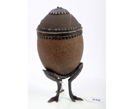 Early George V silver mounted Emu egg with decorative leaf borders, gilded interior and separate cover, on a stand in the for
