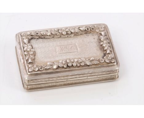 William IV silver vinaigrette of rectangular form, with engine-turned decoration and hinged cover with raised floral border a