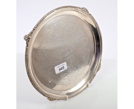 Victorian silver salver of circular form, with gadrooned shell and scroll border, centre with engraved foliate decoration and