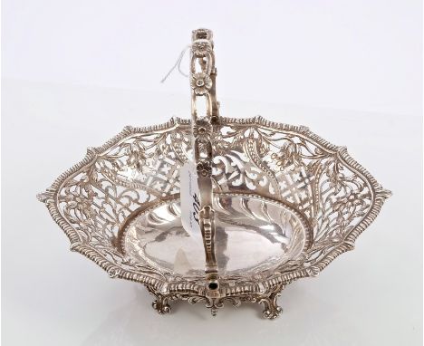 George III silver sweetmeat dish of oval form, with cross, scroll and foliate decoration with gadrooned border and floral cha