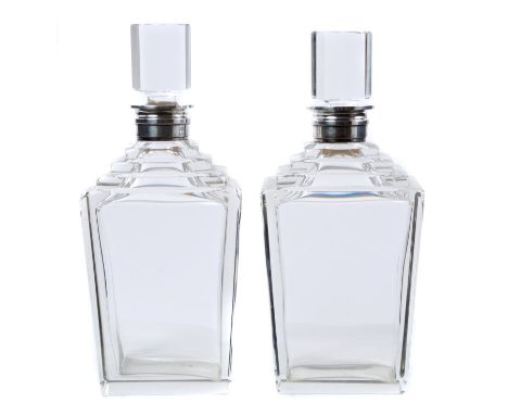 Pair impressive 1930s cut glass decanters of stepped tapering form, in the Art Deco style, with silver collars and facet glas