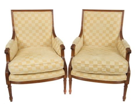 Pair of French carved beech armchairs with square and pad arms with lemon yellow upholstery, channel carved, show wood frames