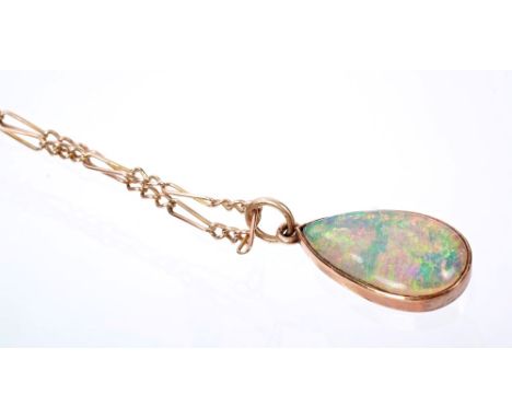 Edwardian opal doublet pendant with a pear-shape opal cabochon in rose gold setting, on chain