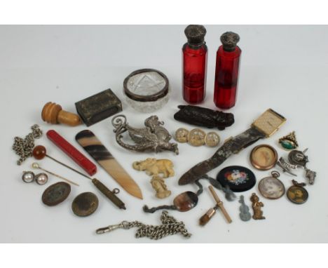 Collection of vertu items, to include a Japanese carved hardwood netsuke of a cicada, Victorian ruby glass scent bottles, jew