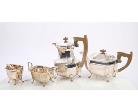 1930s Art Deco-style four piece tea set, comprising teapot of faceted form, with fruitwood handle, hinged domed and faceted c